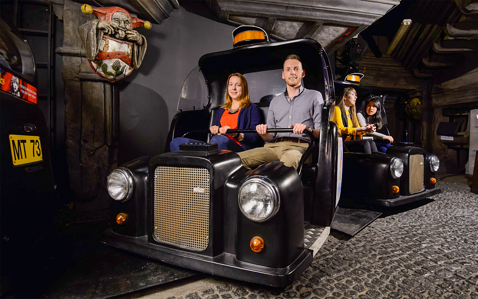 Double-decker bus on Spirit of London Ride near Big Ben and Houses of Parliament.